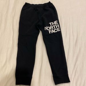 North Face boys jogger sweatpants in black with white writing size Medium 10